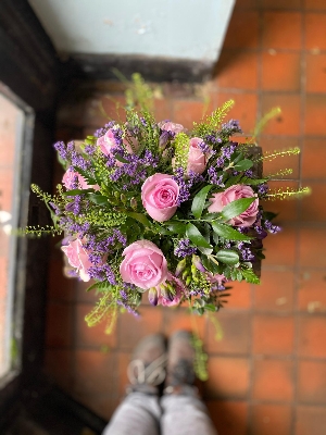 pink rose and lilac freesia posy