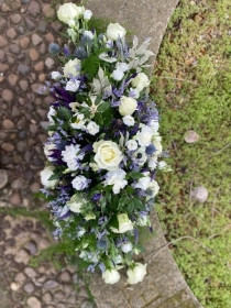 White, Purple and Blue casket spray
